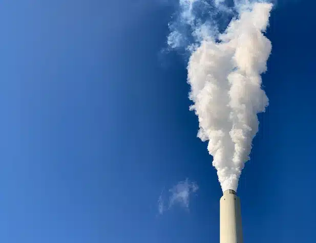 Smoke coming ou tof a smokestack